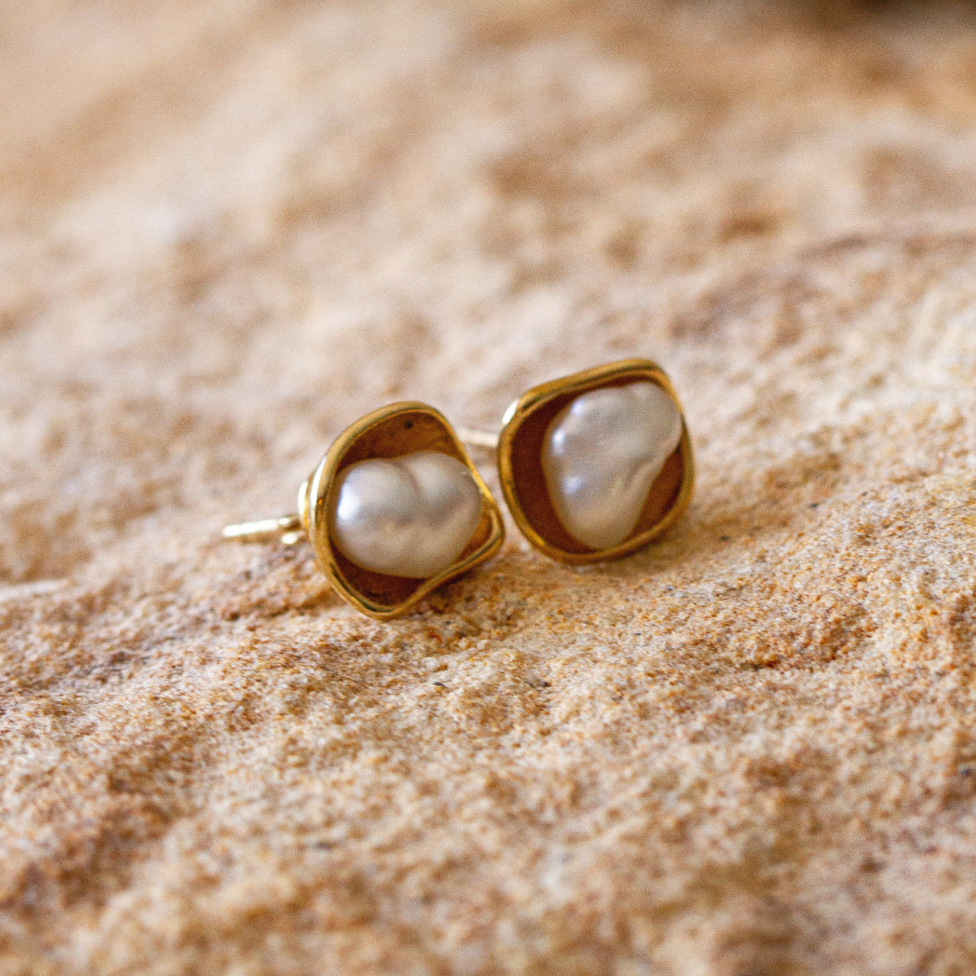 A pair of stunning Kimberley Lily pearl studs, featuring Cygnet Bay grown Australian South Sea pearls set in a unique lily inspired design.