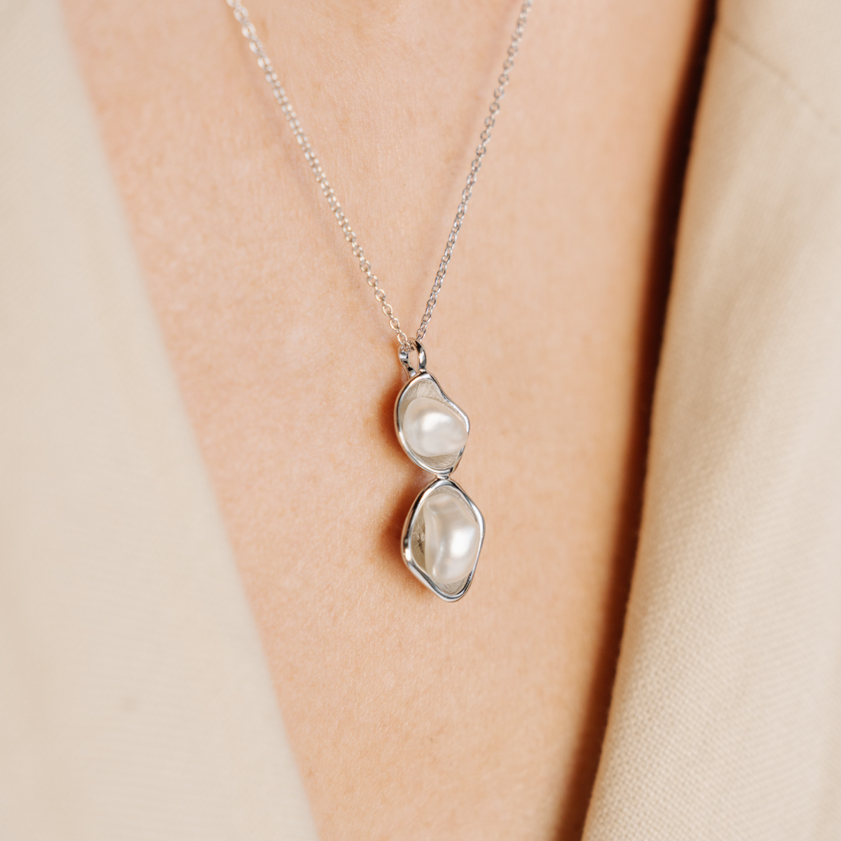 This stunning Kimberley Lily Twin Pearl Pendant features our Cygnet Bay (WA) grown 5-8mm A grade Australian South Sea Keshi Pearls, set in a unique gold design.