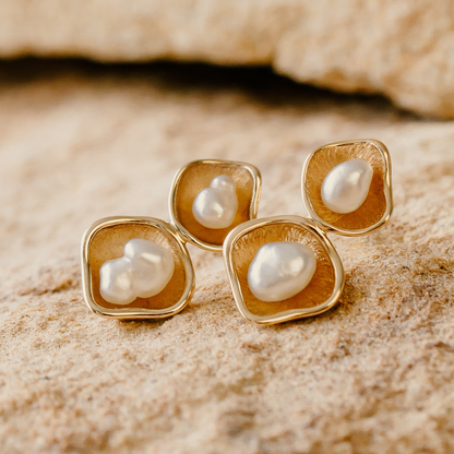 A pair of stunning Kimberley Lily Twin studs featuring Cygnet Bay grown Australian South Sea keshi pearls set in a unique lily inspired design in gold.