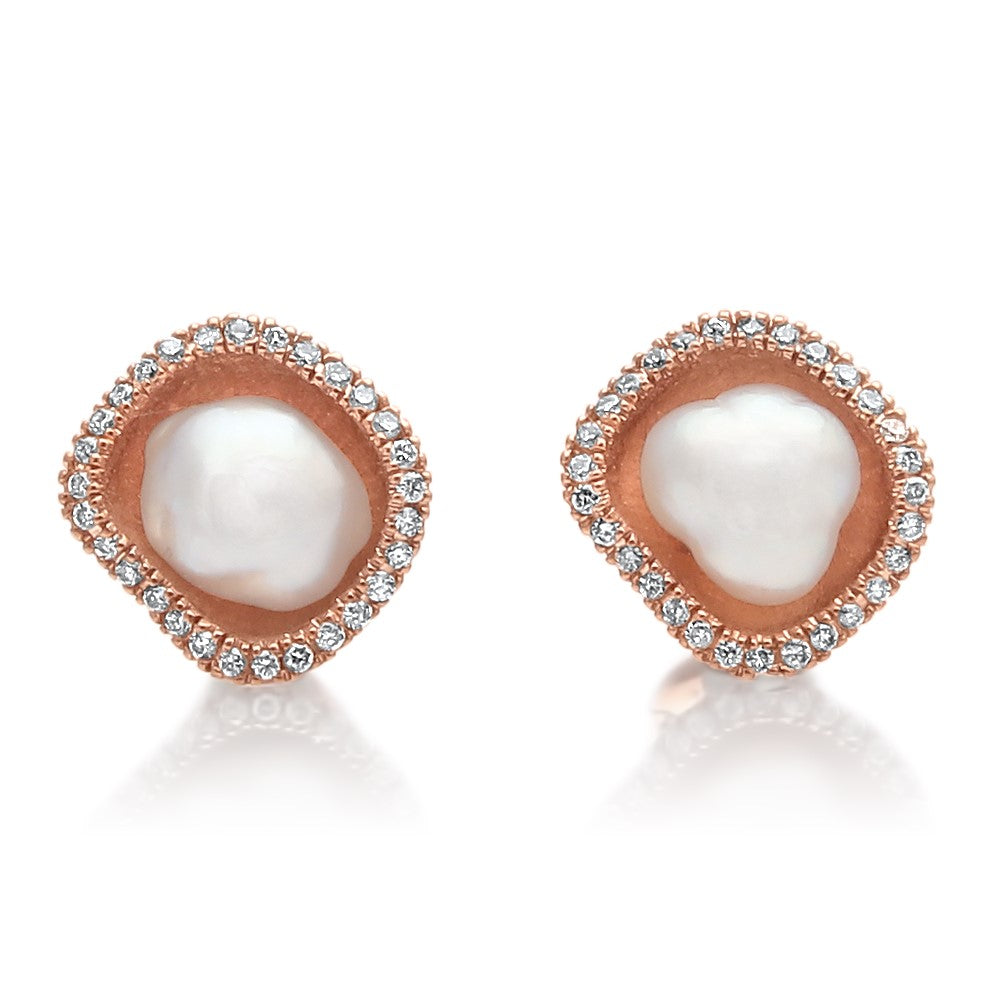 A pair of beautiful Kimberley Lily Diamond Studs featuring a pair of Cygnet Bay grown Australian South Sea Keshi pearls set in a unique lily inspired design, with a halo of sparkling white diamonds in rose gold.