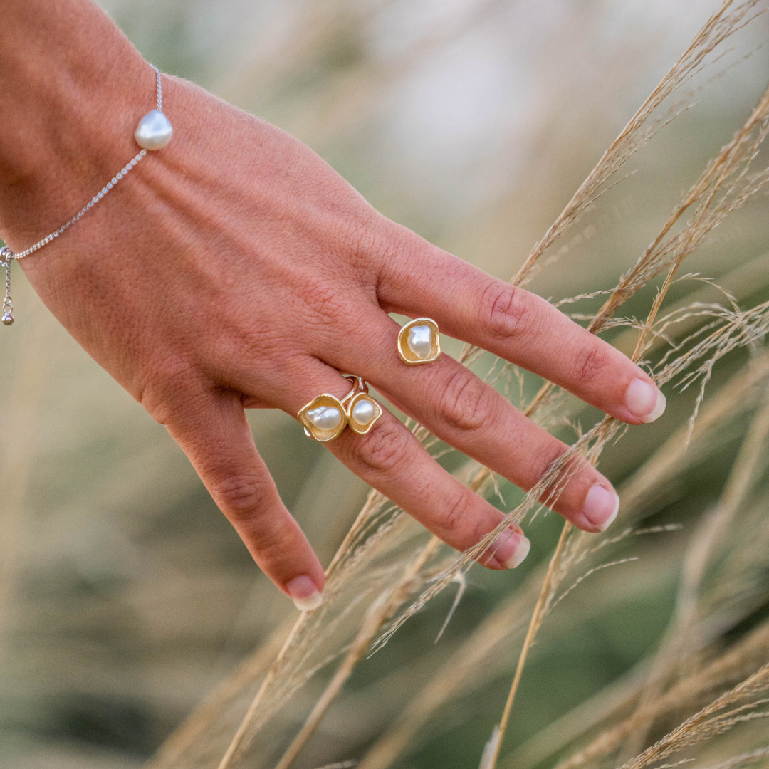 A woman wears her stunning Kimberley Lily Float Ring