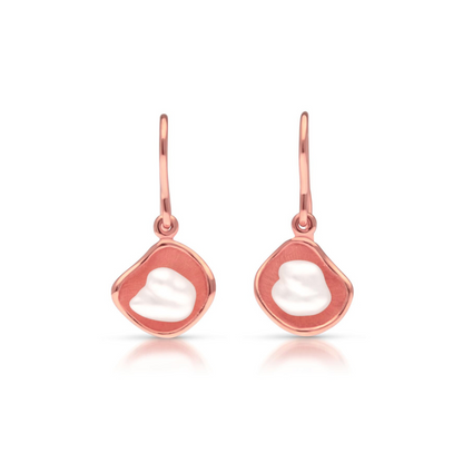 Kimberley Lily pearl hook earrings that feature a pair of beautiful Australian grown South Sea Keshi pearls set in a unique lily inspired design, in rose gold.