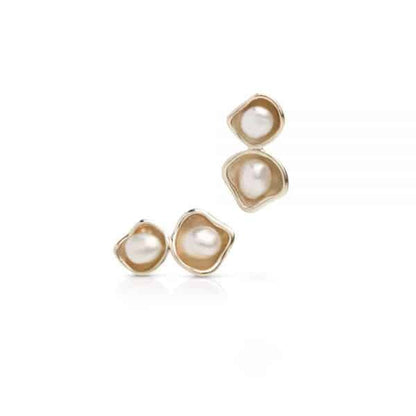 A pair of Kimberley Lily Pearl Twin Studs featuring a Cygnet Bay grown Australian South Sea Keshi pearls set in a twin 
gold.