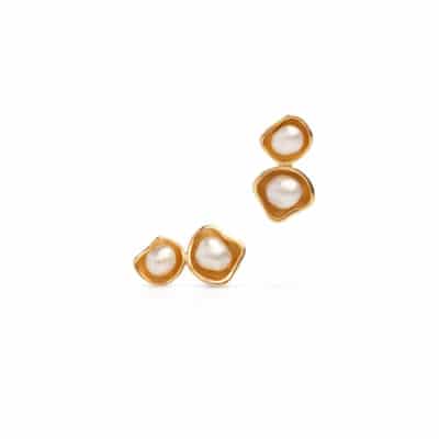 A pair of Kimberley Lily Pearl Twin Studs featuring a Cygnet Bay grown Australian South Sea Keshi pearls set in a yellow gold.