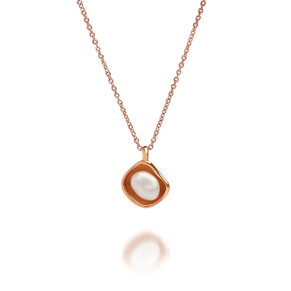 A stunning Kimberley Lily Pearl Pendant featuring an Australian grown Australian Keshi pearl set in a unique lily inspired design in rose gold.