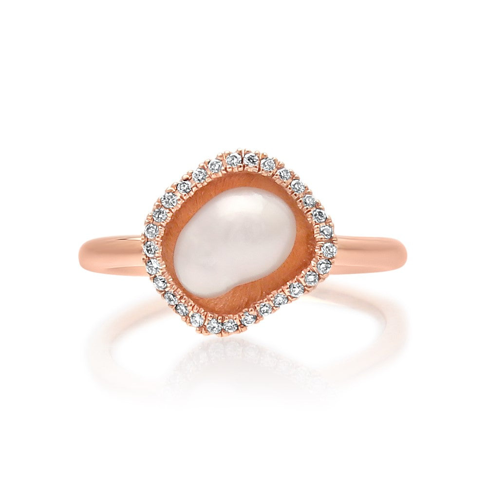 A stunning Kimberley Lily Petite Diamond Pearl Ring featuring an Australian South Sea Keshi pearl set in rose gold with a halo of sparkling white diamonds.