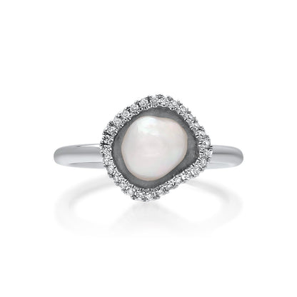 A stunning Kimberley Lily Petite Diamond Pearl Ring featuring an Australian South Sea Keshi pearl set in white gold with a halo of sparkling white diamonds.