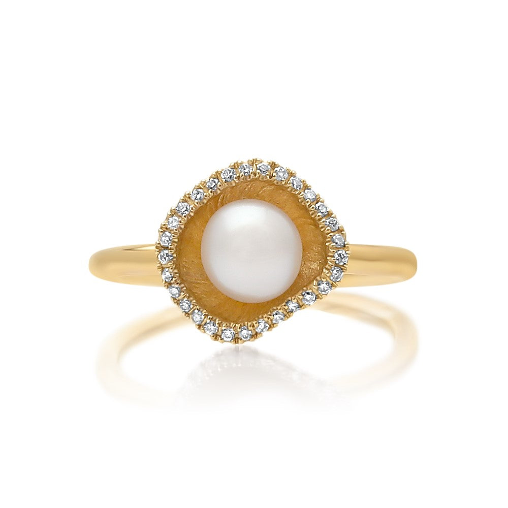 A stunning Kimberley Lily Petite Diamond Pearl Ring featuring an Australian South Sea Keshi pearl set in yellow gold with a halo of sparkling white diamonds.