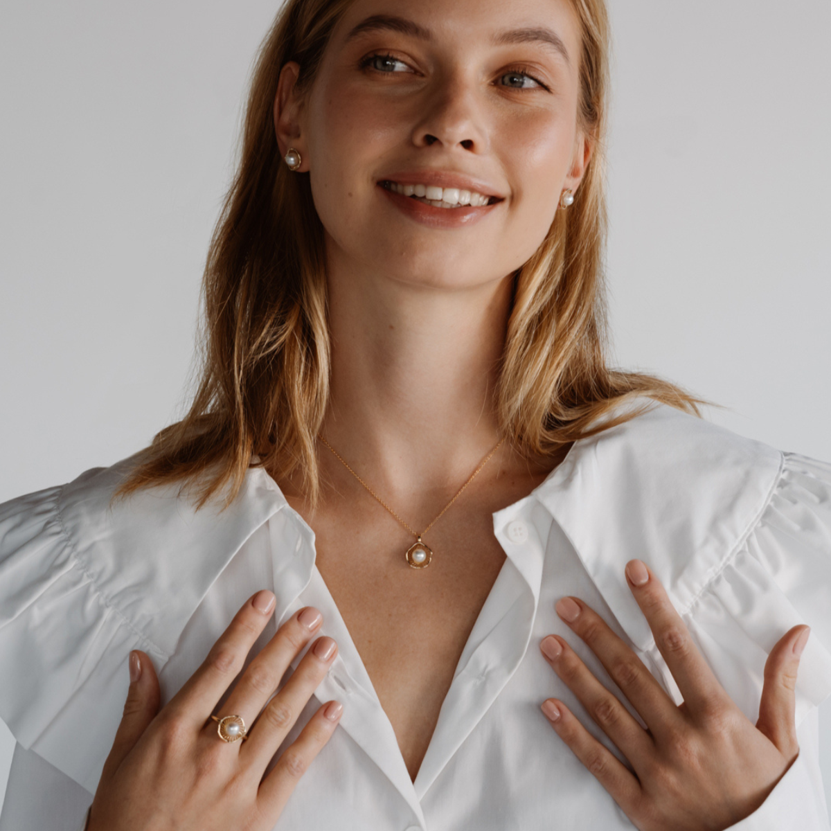 A stunning Mangrove Lily Pearl Pendant featuring a Broken Bay (NSW) 7mm AAA grade Australian Akoya pearl set in 9ct gold. Mirroring the Mangrove Lily, the filigree metalwork featured in the design of this collection evokes the umbrella of petals belonging to this coastal marvel.