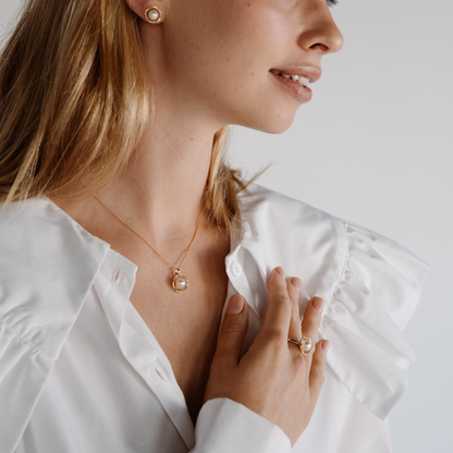 A stunning Mangrove Lily Pearl Ring featuring a Broken Bay (NSW) 7mm AAA grade Australian Akoya pearl set in 9ct gold. Mirroring the Mangrove Lily, the filigree metalwork featured in the design of this collection evokes the umbrella of petals belonging to this coastal marvel.