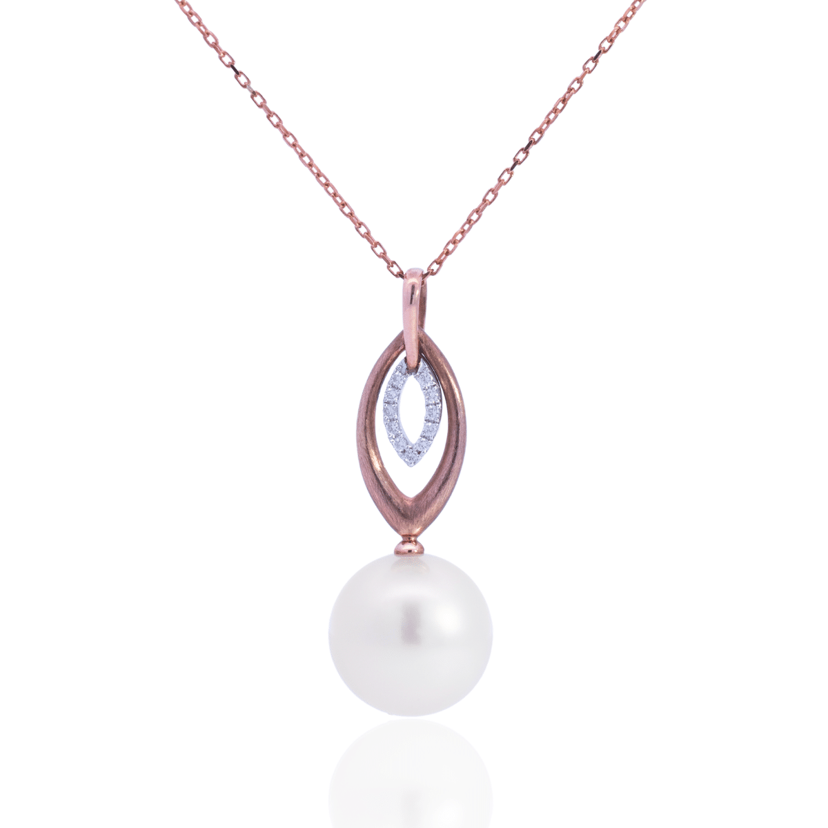 A unique Marquise Pearl Pendant featuring a round Australian South Sea pearl set alongside a marquise shaped diamond halo and gold design.