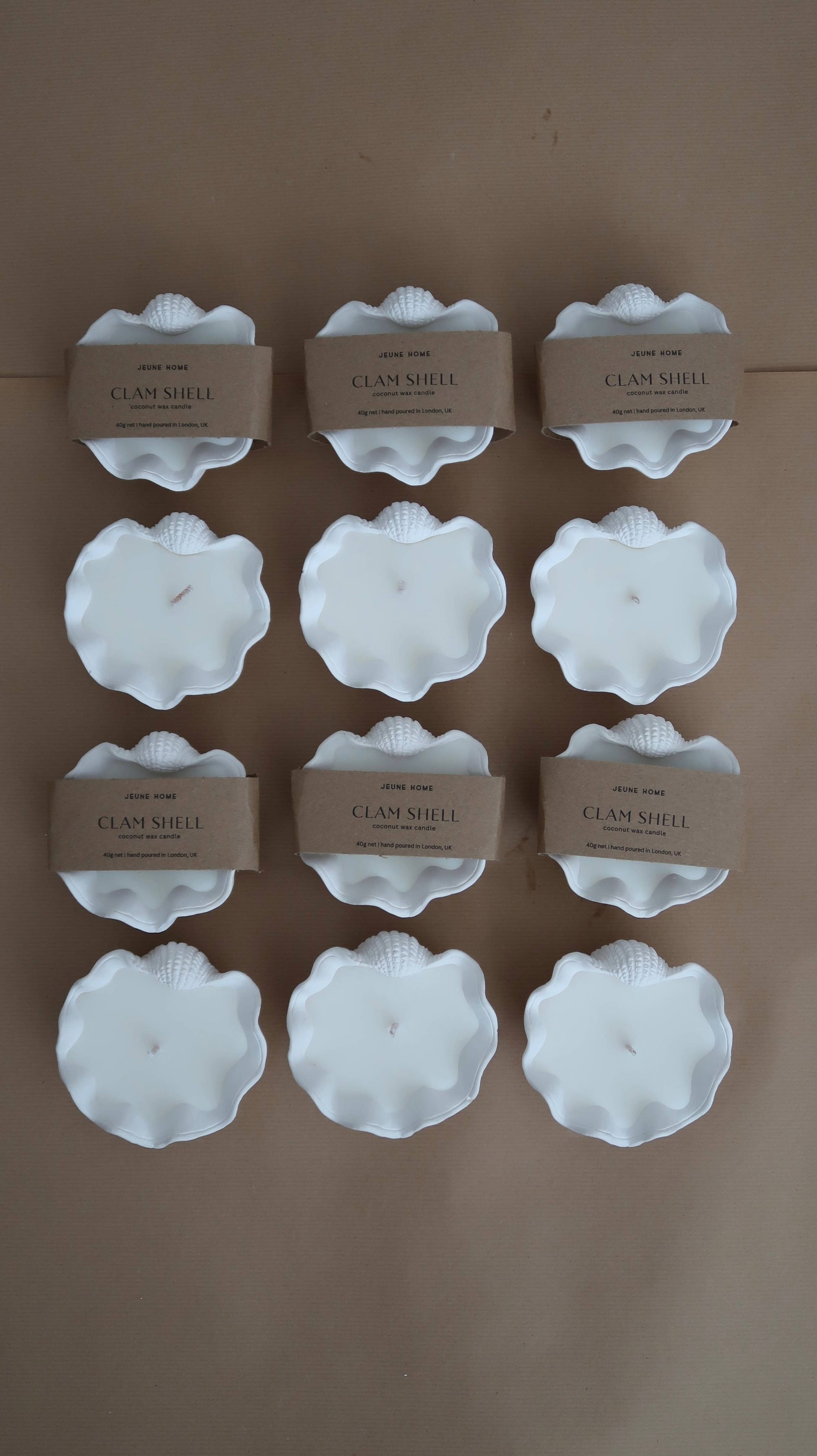 Elevate your ambiance with a Mini Clamshell Candle. Crafted with cruelty-free scents and coconut wax, each candle is meticulously hand-poured to order, ensuring a unique experience for every customer. Each jar is individually hand poured.  

