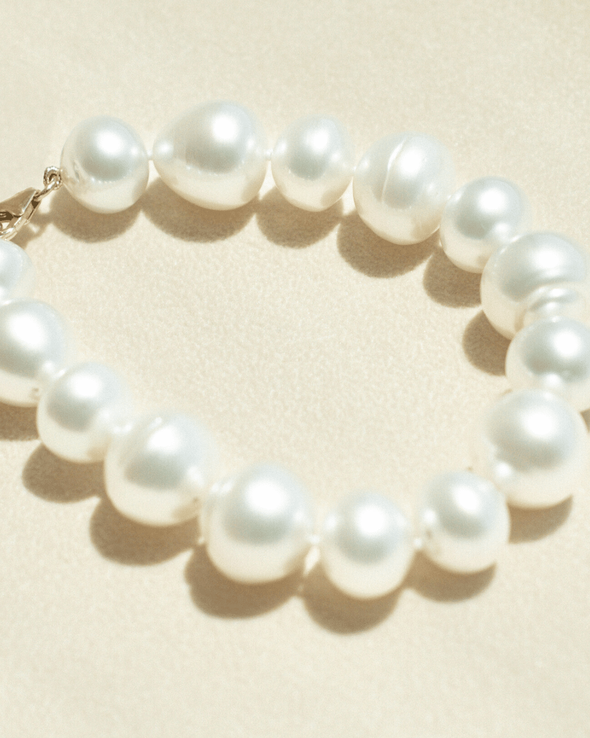 This striking Pearl Strand Bracelet features fifteen (15) 12 to 14mm mix shaped A2+ to B1+ grade Cygnet Bay (WA) grown Australian South Sea pearls. This 18cm pearl strand is set with a 9ct Yellow Gold clasp.