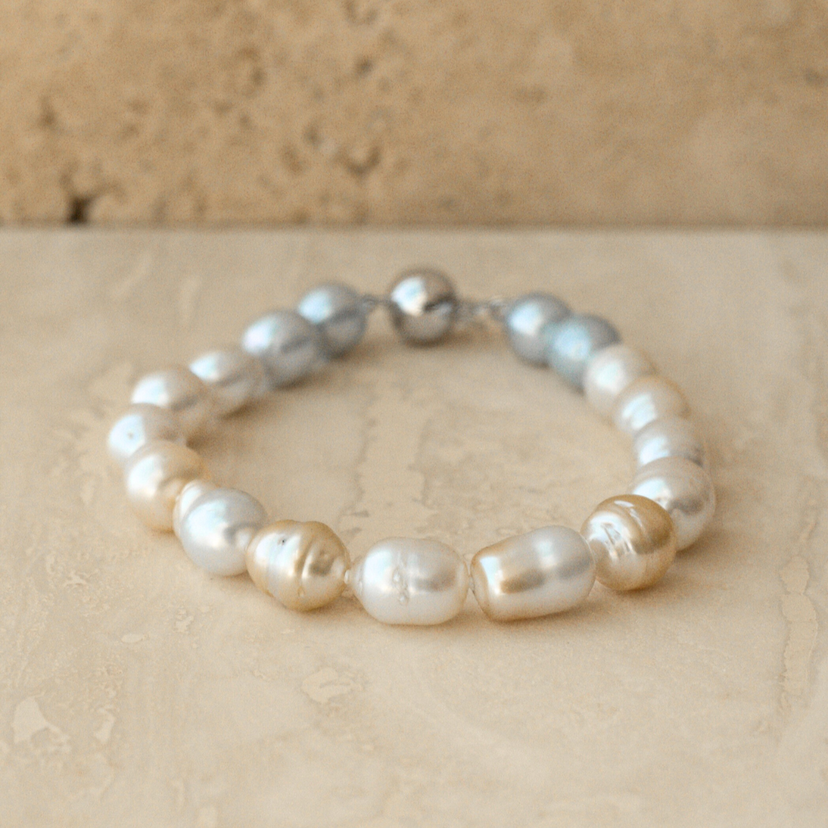 This striking Pearl Strand Bracelet features seventeen (17) 7mm to 8.5mm, Mix Colour A3 to B2 grade Cygnet Bay (WA) grown Australian South Sea pearls. This 17cm pearl strand is set with an 18ct White Gold clasp.