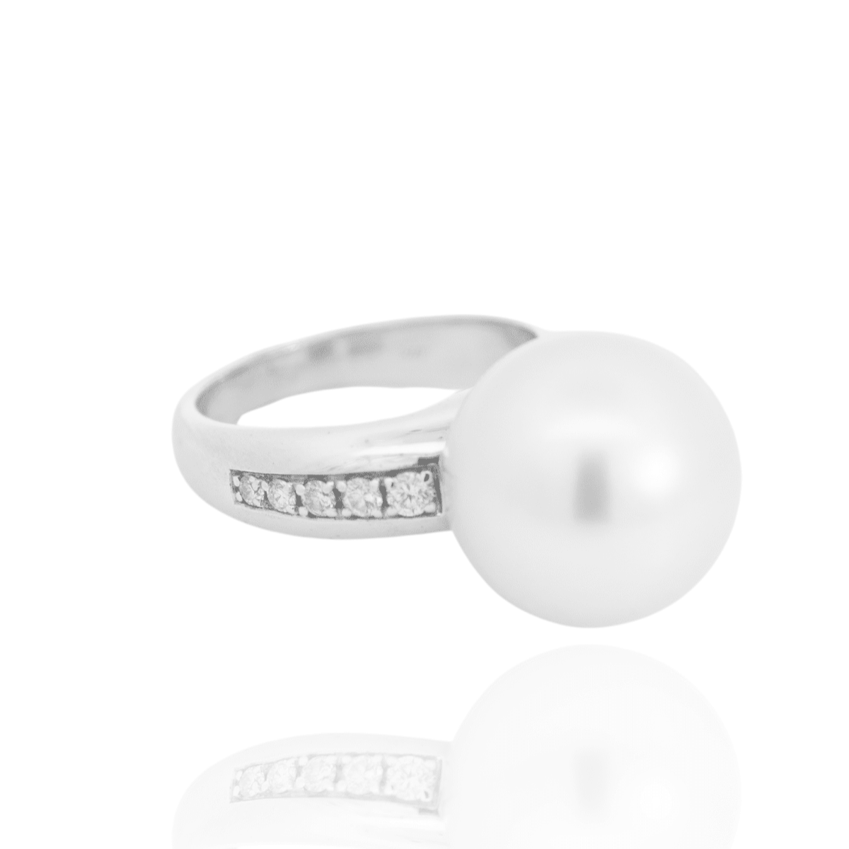 A classic Mojo Diamond Pearl Ring features a Cygnet Bay (WA) grown Australian South Sea pearl set alongside a band of White Diamonds.