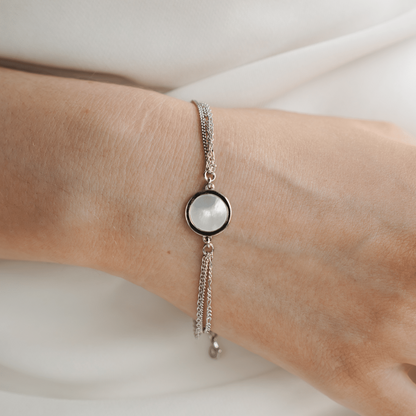 The timeless My Planet Bracelet features our Australian South Sea Cygnet Bay Mother of Pearl shell set in Sterling Silver.

