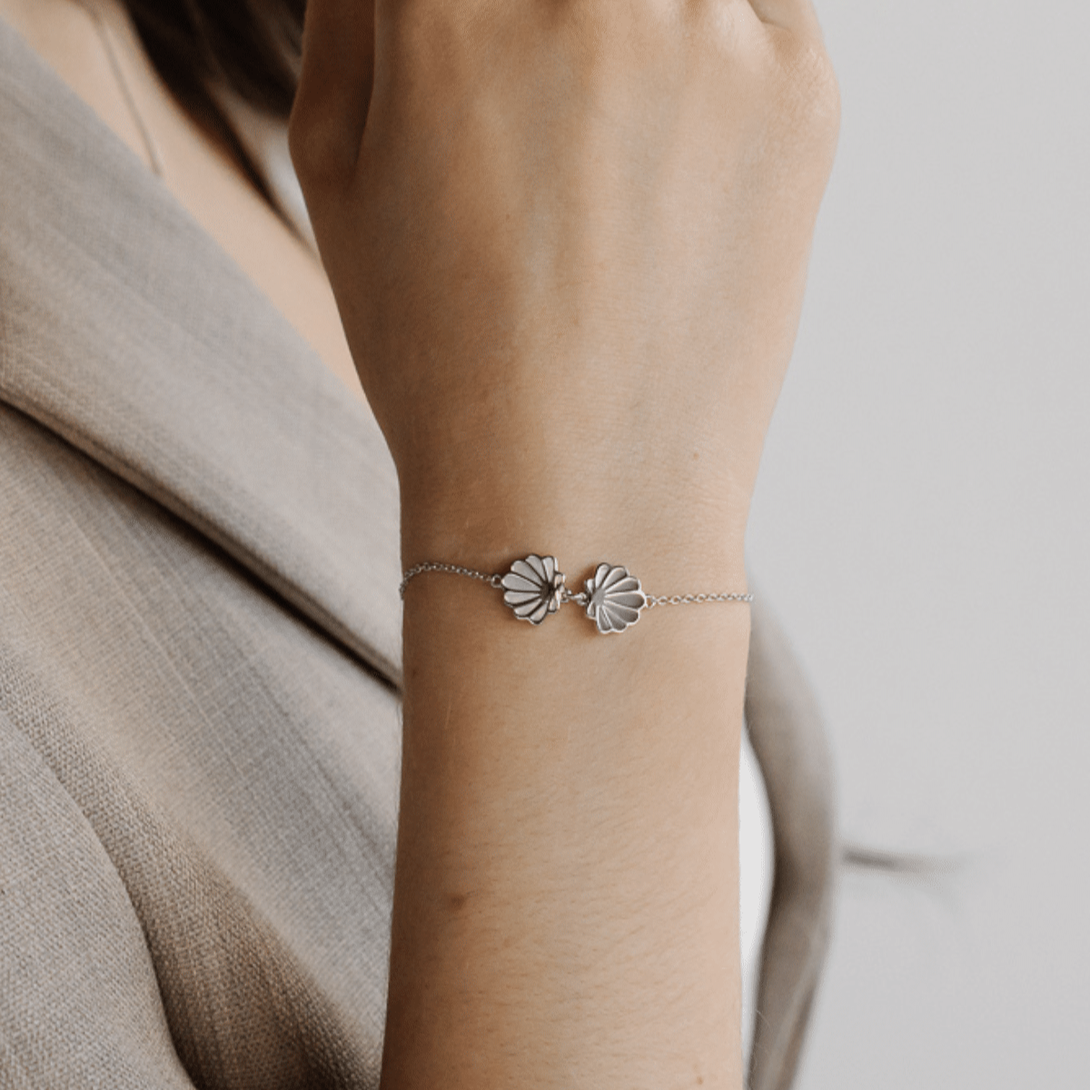 The stunning Petite Shell Bracelet features our Australian South Sea Cygnet Bay Mother of Pearl shell set in Sterling Silver.