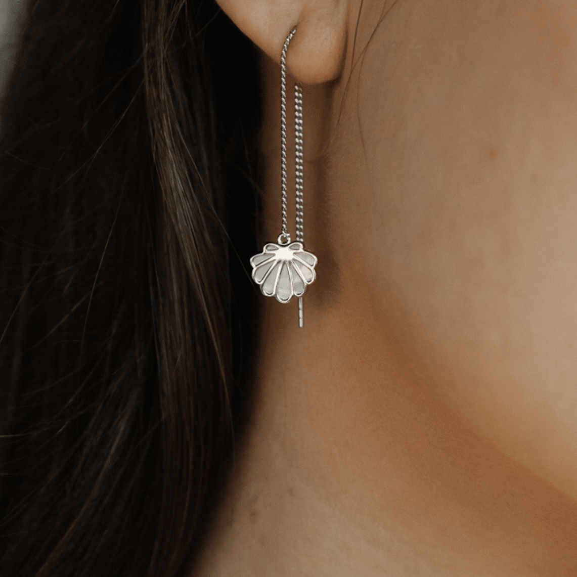 The stunning Petite Shell Thread Through Earrings features our Cygnet Bay (WA) grown Australian South Sea Mother of Pearl shell set in Sterling Silver.