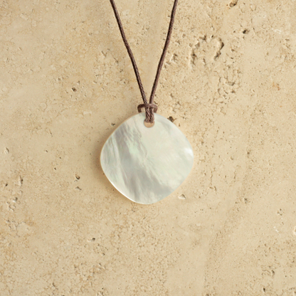 Our stunning Mother of Pearl Nacre Necklace features our Cygnet Bay grown Mother of Pearl shell carved into a diamond shape, strung on a leather cord.