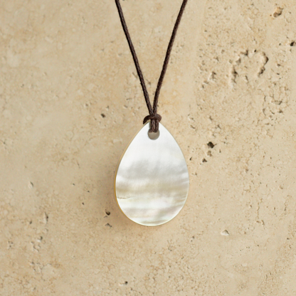 Our stunning Mother of Pearl Nacre Necklace features our Cygnet Bay grown Mother of Pearl shell carved into a tear drop shape, strung on a leather cord.