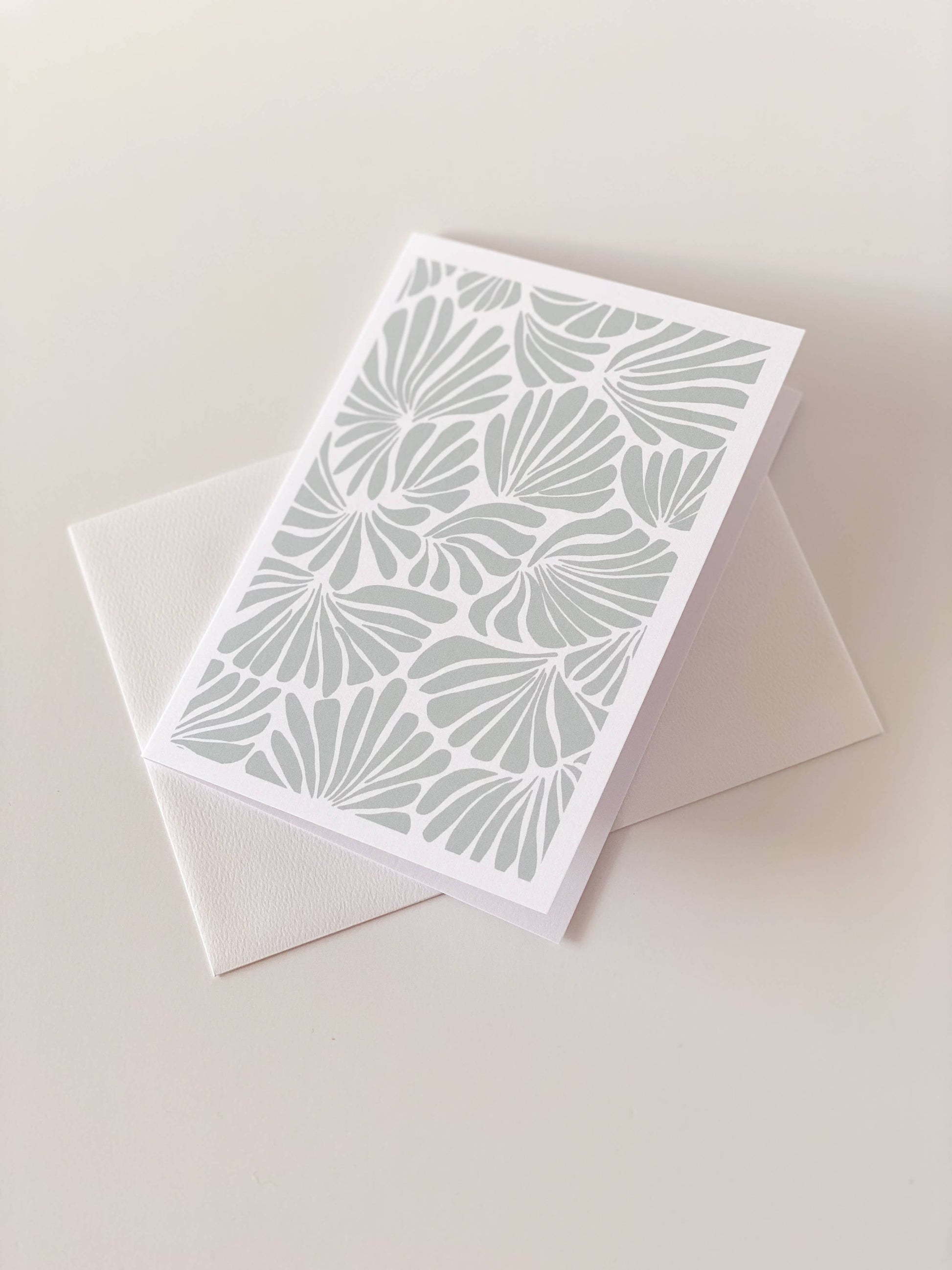 Card with geometric pattern on a beige background