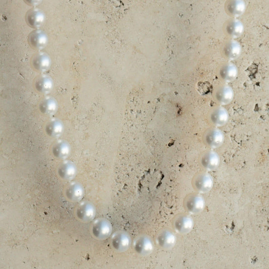 This striking Pearl Strand Necklace features fifty-seven (57) 9 to 11mm Near Round A3+ to B2 grade Cygnet Bay (WA) grown Australian South Sea pearls. This 63cm pearl strand is set with a 9ct White Gold clasp.