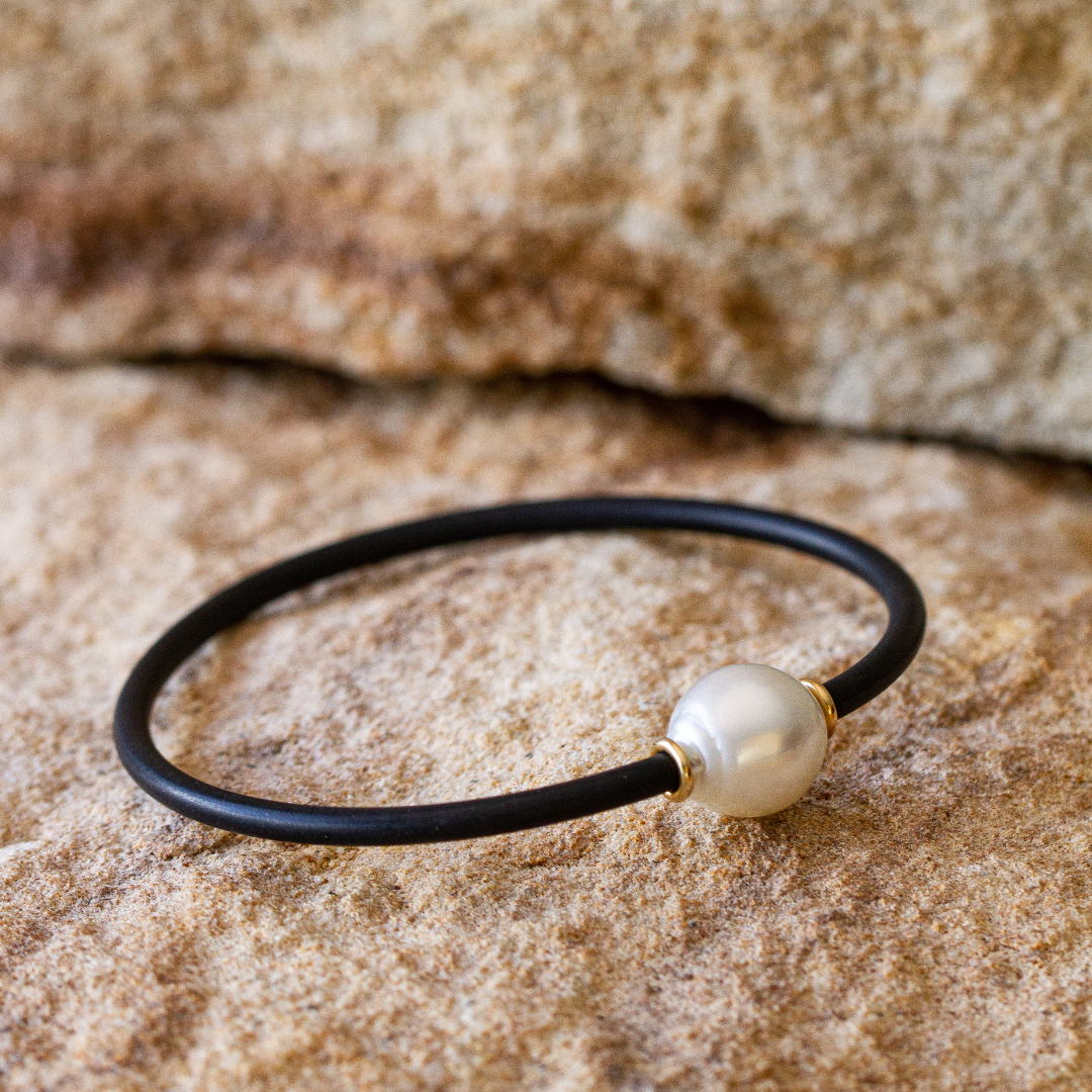 Our Neoprene bracelets feature a Cygnet Bay (WA) grown Australian South Sea pearl set on a neoprene band.