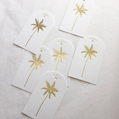 Luxury tags for gifting and decorating, in a die-cut arch shape with hole punch.

