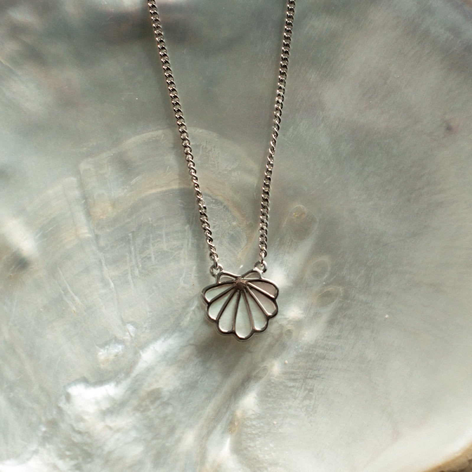 The stunning Petite Shell Necklace features our Australian South Sea Cygnet Bay Mother of Pearl shell set in Sterling Silver on an adjustable chain.