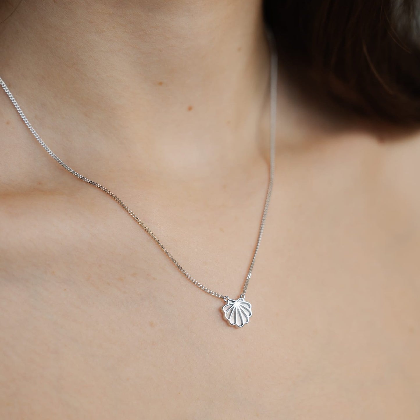 The stunning Petite Shell Necklace features our Australian South Sea Cygnet Bay Mother of Pearl shell set in Sterling Silver on an adjustable chain.