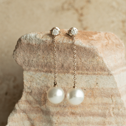 This incredible Provenance Diamond Pearl Earrings features Cygnet Bay (WA) grown Australian South Sea pearls set on a gold chain with a pair of Diamond Studs.