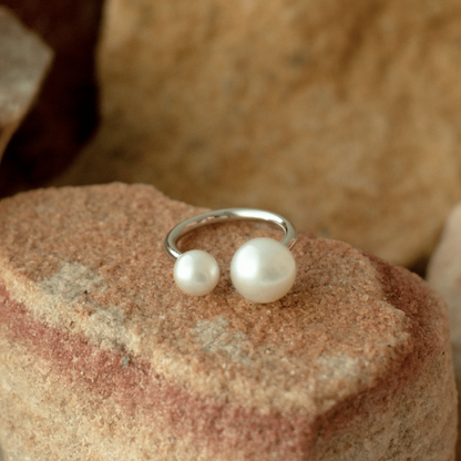 This incredible Provenance Open Pearl Ring features a Cygnet Bay (WA) grown Australian South Sea pearl alongside a Broken Bay (NSW) grown Australian Akoya pearl set on a gold band.