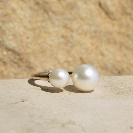 This incredible Provenance Open Pearl Ring features a Cygnet Bay (WA) grown Australian South Sea pearl alongside a Broken Bay (NSW) grown Australian Akoya pearl set on a gold band.