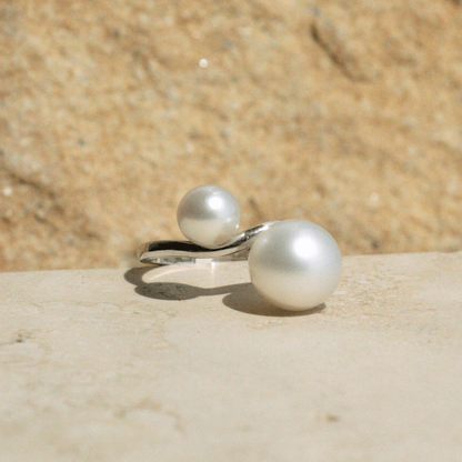 This incredible Provenance Pearl Twist Ring features a Cygnet Bay (WA) grown Australian South Sea pearl alongside a Broken Bay (NSW) grown Australian Akoya pearl set on a gold band.