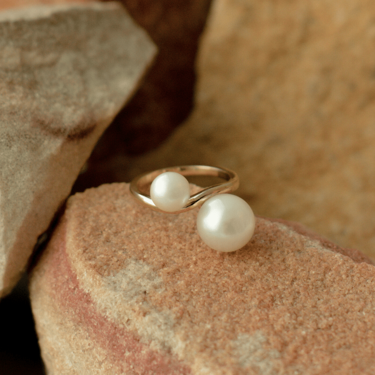 This incredible Provenance Pearl Twist Ring features a Cygnet Bay (WA) grown Australian South Sea pearl alongside a Broken Bay (NSW) grown Australian Akoya pearl set on a gold band.