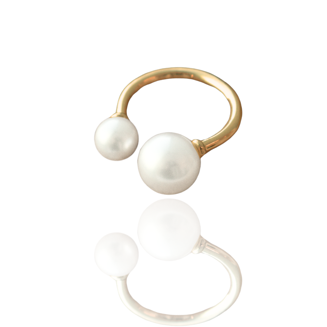 This incredible Provenance Open Pearl Ring features a Cygnet Bay (WA) grown Australian South Sea pearl alongside a Broken Bay (NSW) grown Australian Akoya pearl set on a yellow gold band.