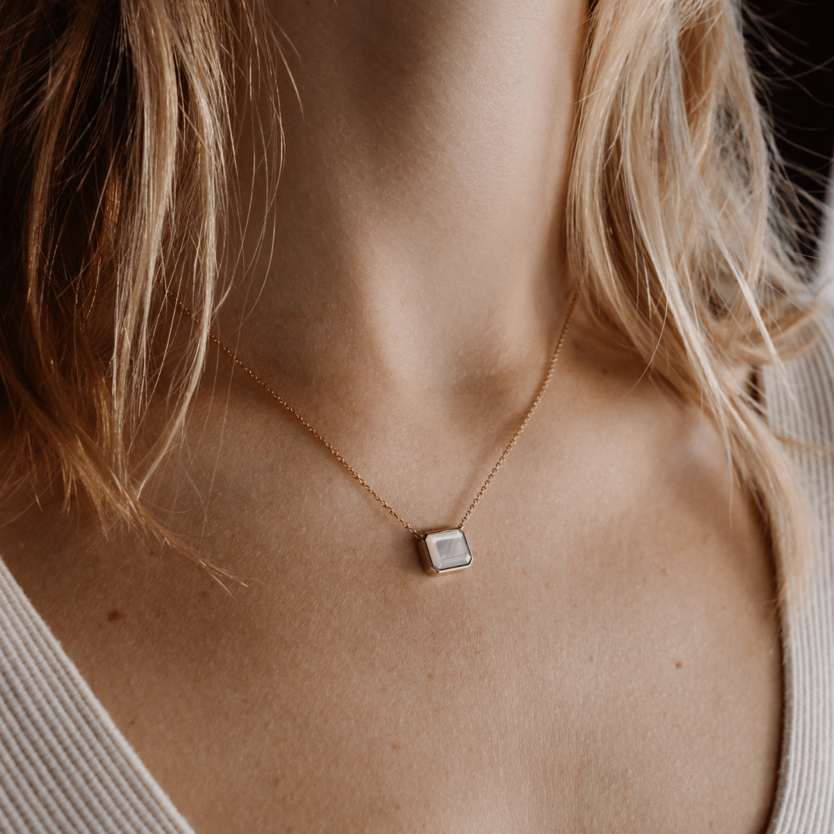 This stunning Radiance Emerald Cut Necklace features faceted Mother of Pearl grown at our Cygnet Bay Pearl Farm set on a gold chain. 