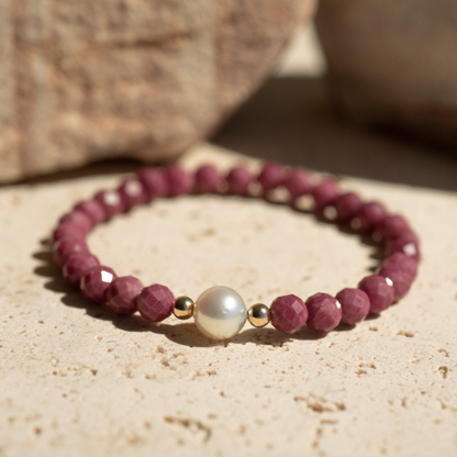 Featuring a luminous Cygnet Bay (WA) grown 8.5mm Round B1 grade Australian South Sea pearl nestled alongside 28 faceted rhodonite beads and two 9ct yellow gold rondels