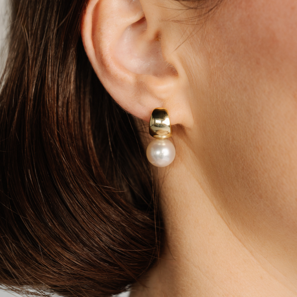These Rounded Wide Pearl Huggie Earrings feature a pair of Cygnet Bay (WA) grown 10mm Round B2 grade Australian South Sea pearls grown at our very own Cygnet Bay Pearl Farm and set in your choice of gold plated sterling silver or sterling silver.