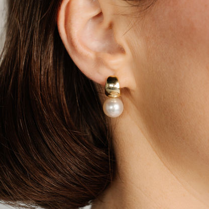 These Rounded Wide Pearl Huggie Earrings feature a pair of Cygnet Bay (WA) grown 10mm Round B2 grade Australian South Sea pearls grown at our very own Cygnet Bay Pearl Farm and set in your choice of gold plated sterling silver or sterling silver.