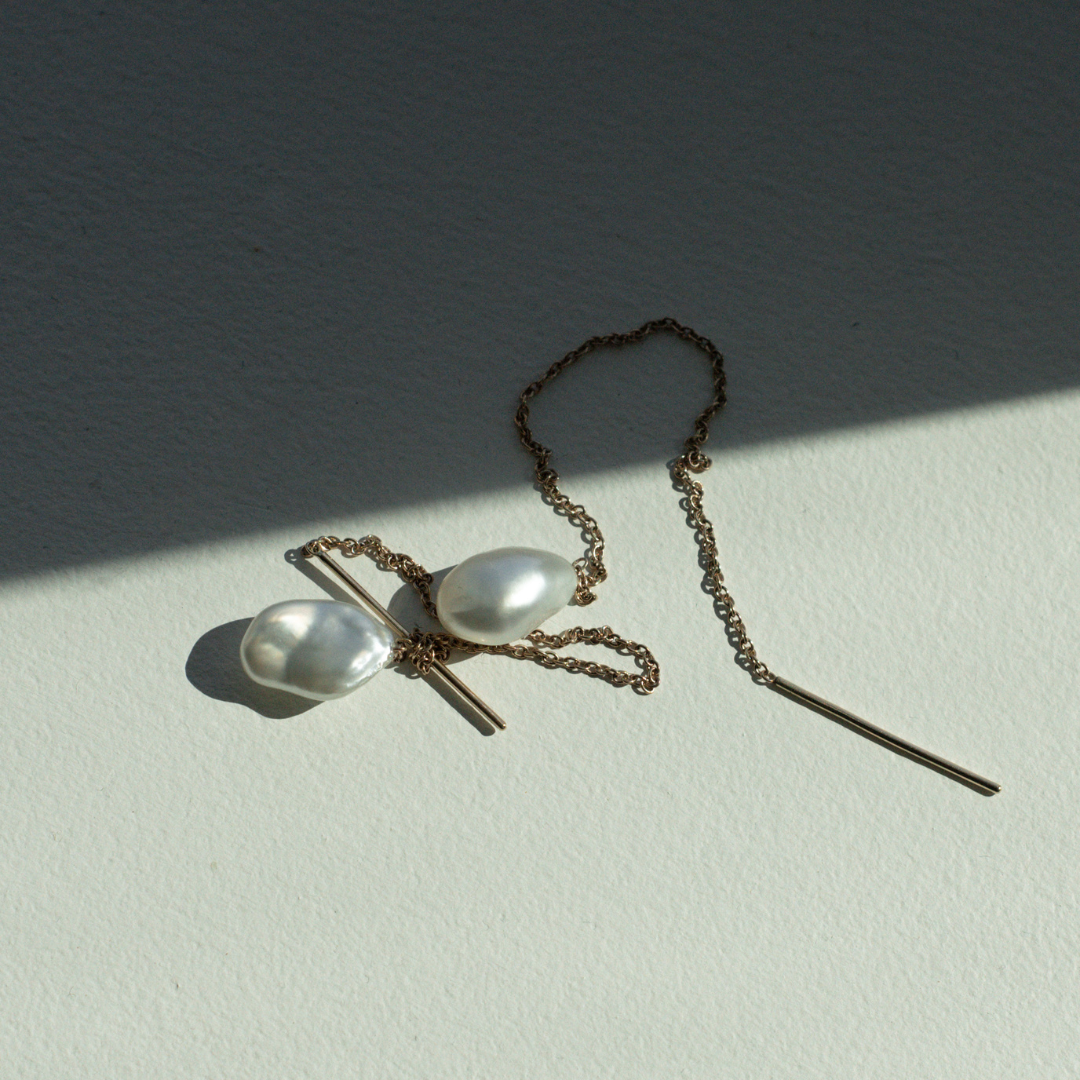 These gorgeous Savanna Pearl Thread Earrings features Cygnet Bay (WA) grown Australian South Sea Keshi Pearls set on a gold chain.