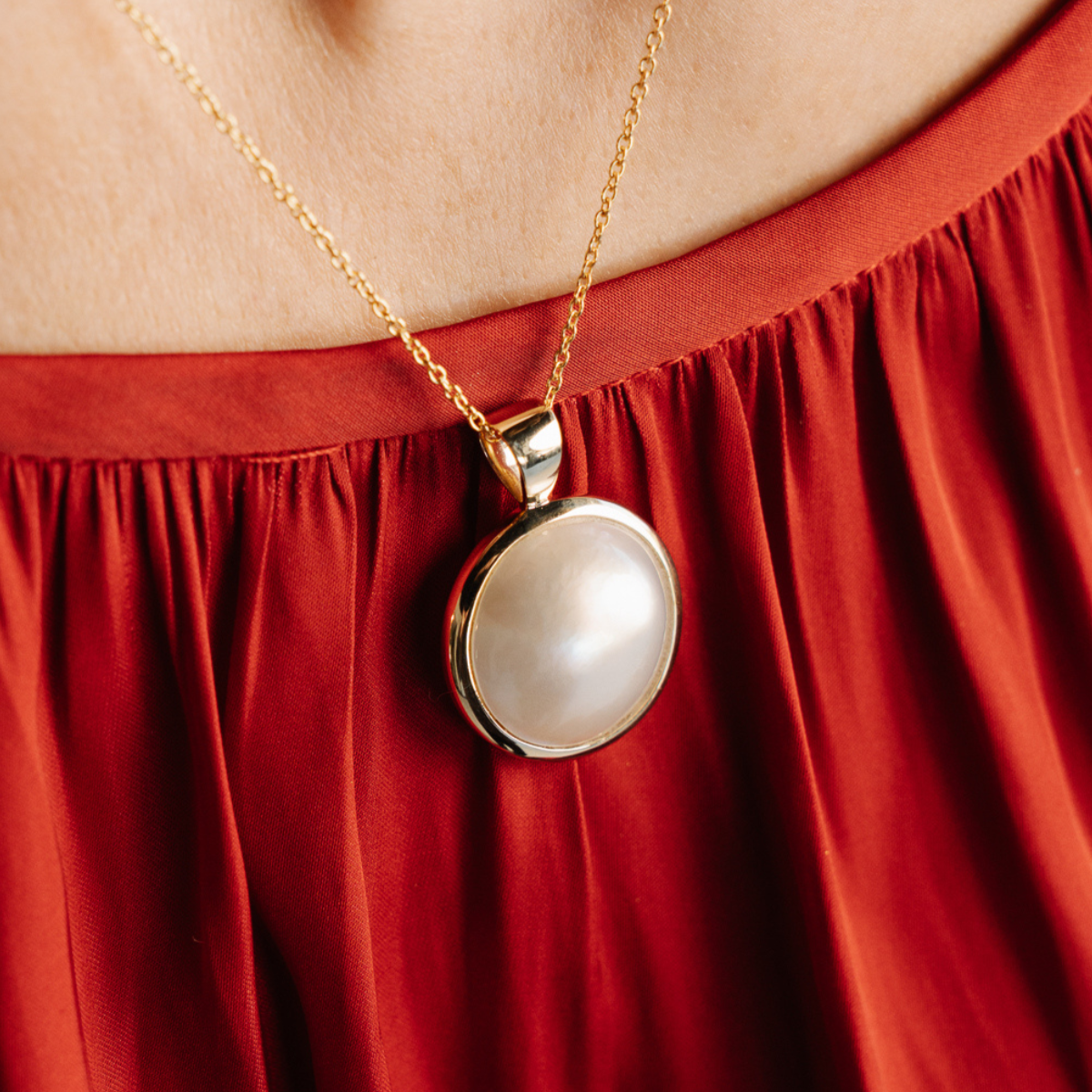 This gorgeous Save the Children Pearl Pendant features a Cygnet Bay (WA) grown 15mm A grade Australian South Sea Mabe pearl set in gold.