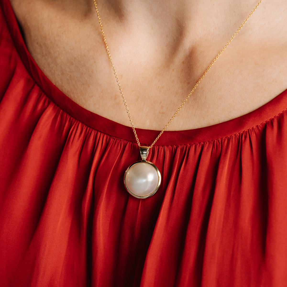This gorgeous Save the Children Pearl Pendant features a Cygnet Bay (WA) grown 15mm A grade Australian South Sea Mabe pearl set in gold.