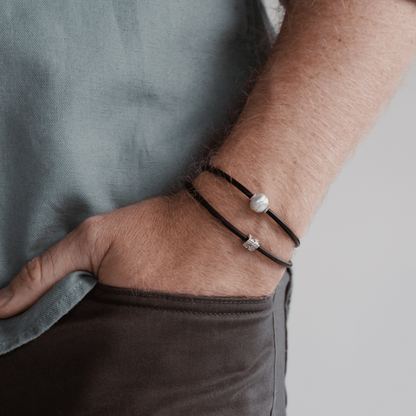 Our Seagrass Neoprene bracelets are a casual everyday piece for both male and female featuring a Sterling Silver Seagrass motif.