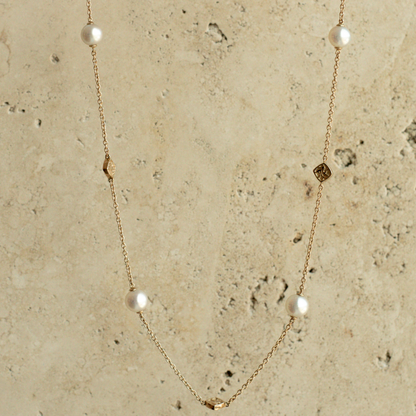 An elegant Seagrass Pearl Necklace featuring Broken Bay (NSW) grown Australian Akoya pearls set on a gold chain.