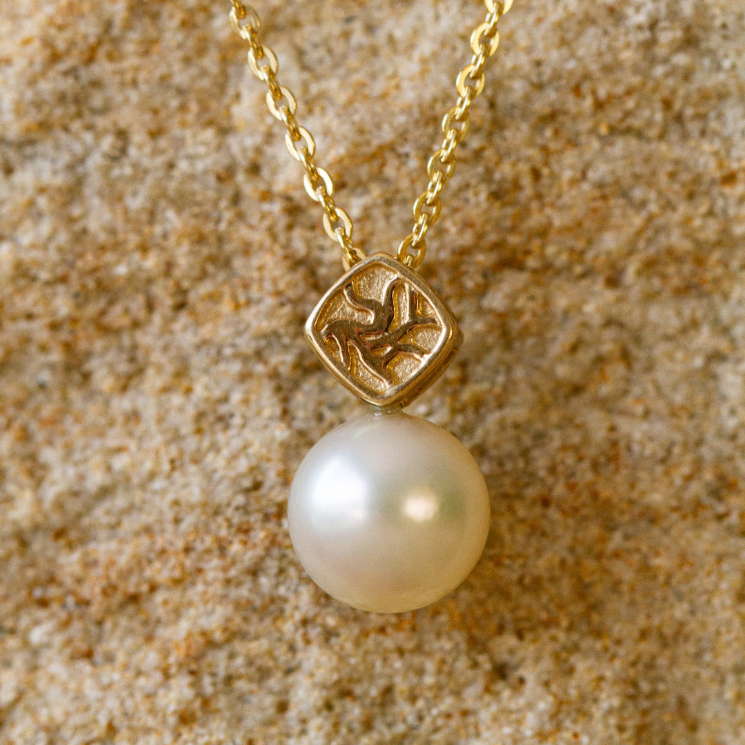 An elegant Seagrass Pearl Pendant featuring a Broken Bay (NSW) grown Australian Akoya pearl set in gold.