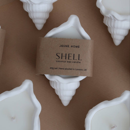 Dive into the serene beauty of our handcrafted Clam Shell Candle – a true testament to artistry and eco-conscious luxury. Carefully crafted from water-based eco resin, each jar encapsulates the essence of coastal elegance, making it an exquisite addition to your home or a thoughtful gift for someone special. Each jar is individually hand poured, in a off white colour with a subtle gloss.  

