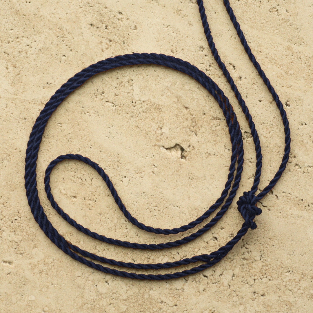 100% Japanese Silk Cord in Navy Colour with silver ends.