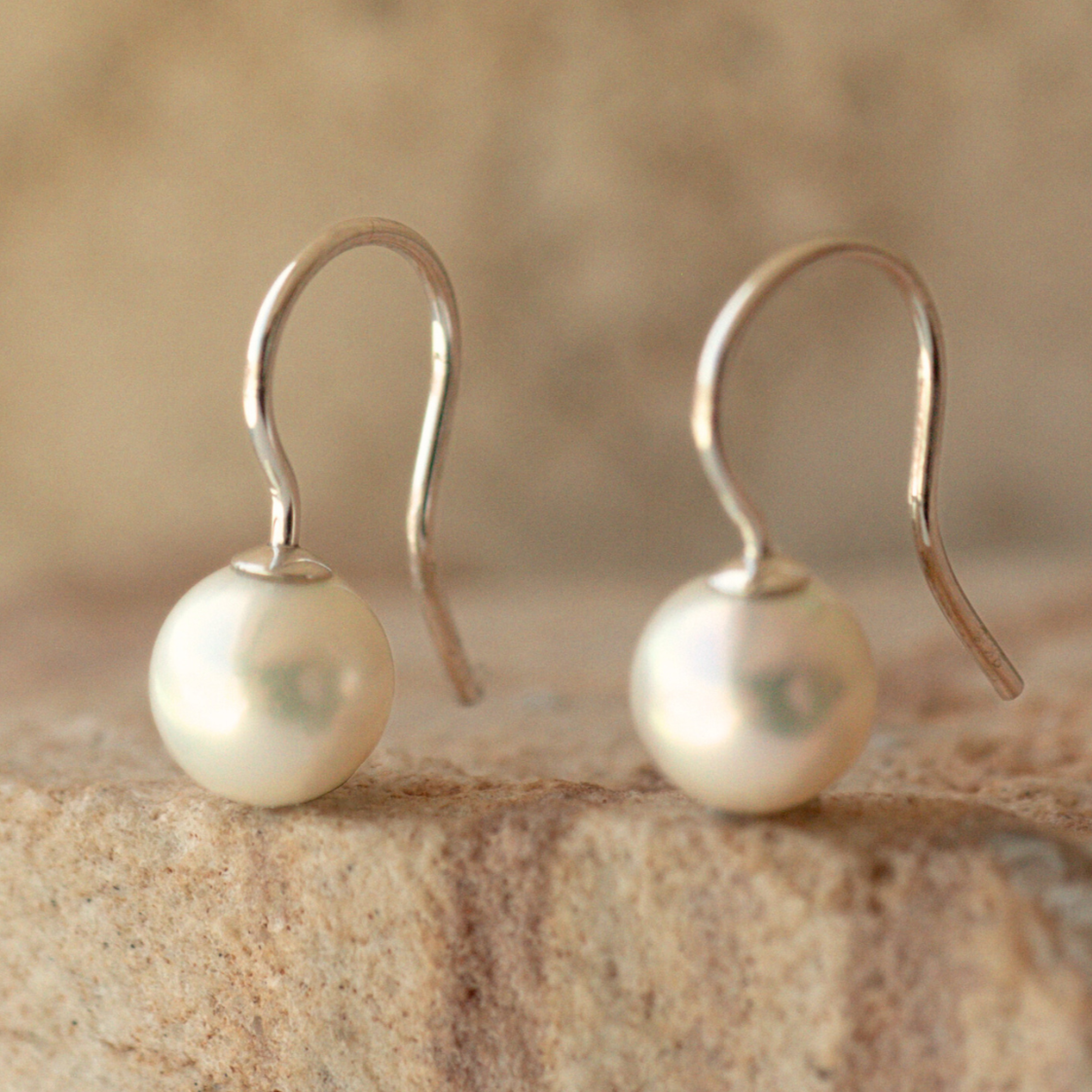 These Simple Pearl Hook Earrings feature a pair of Broken Bay (NSW) grown 7mm AA grade (moderately blemished) Australian Akoya pearls set in 9ct white gold.