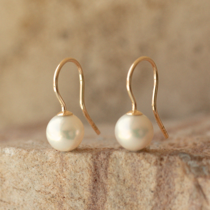 These Simple Pearl Hook Earrings feature a pair of Broken Bay (NSW) grown 7mm AA grade (moderately blemished) Australian Akoya pearls set in 9ct yellow gold.